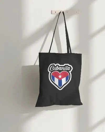 totebag-mockup-hanging-on-holder-with-plain-wall-in-background-062 (1).webp